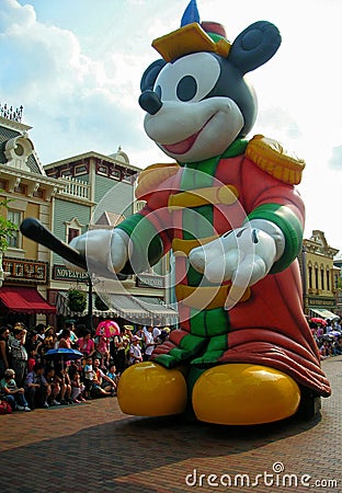 Big standing inflatable Mickey mouse in Parade Editorial Stock Photo