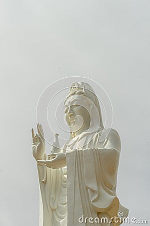 big statue of guanyin bodhisattva on mount in Ho Quoc pagoda (Vietnamese name is Truc Lam Thien Vien) with , Phu Quoc island, Stock Photo