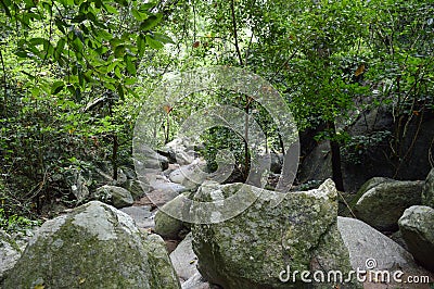 Big stone in chan ta then waterfall Stock Photo