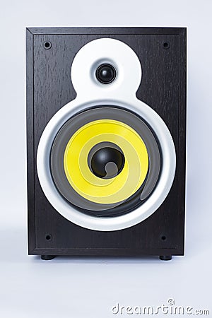 Big subwoofer with yellow speaker on white background,loud music Stock Photo