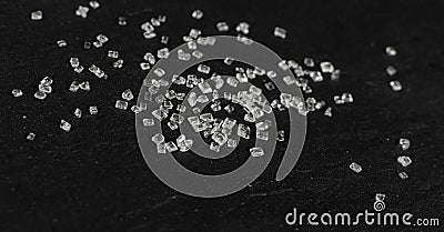 Big Sugar Crystals or Sucrose Crystals on Black Background Stock Photo