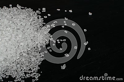 Big Sugar Crystals or Sucrose Crystals on Black Background Stock Photo