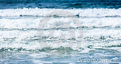 Big surfing ocean sea waves on sandy beach. Stock Photo