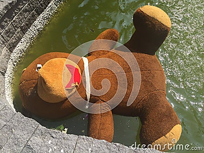 Big teddy bear in a fountain Stock Photo