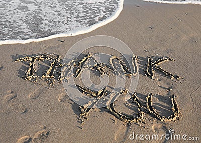 Big Text THANK YOU on the beach Stock Photo