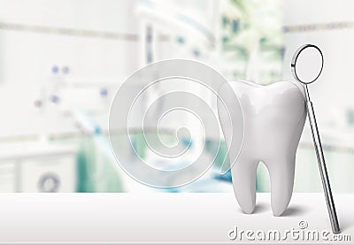 Big tooth and dentist mirror in dentist clinic on Stock Photo