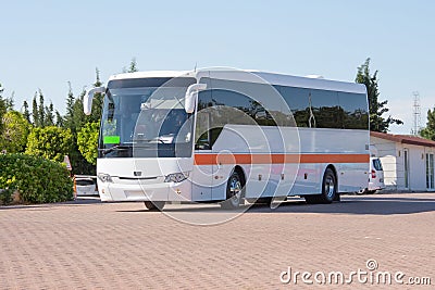 Big tourist buse on parking waiting for passengers Stock Photo