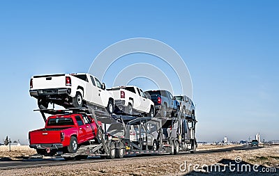 Big truck with car-hauling trailer Stock Photo