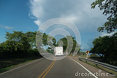 Medium truck on a Colombian highway. Editorial Stock Photo