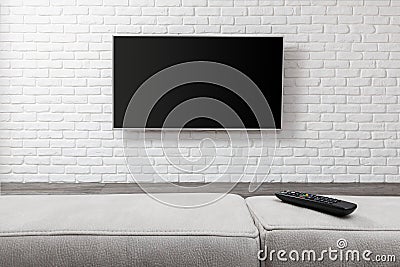 Big TV on the white wall Stock Photo