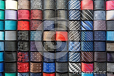 Big variety of different color neckties in a men clothing store Stock Photo