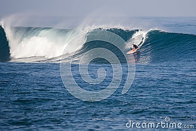 Big wave that frets with surfer Editorial Stock Photo