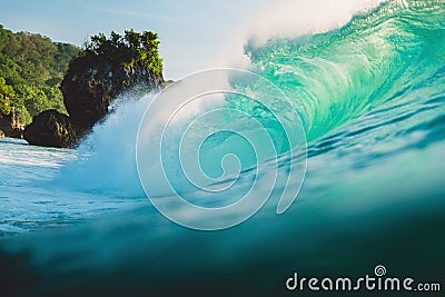 Big wave in ocean. Breaking turquoise wave in Bali Stock Photo