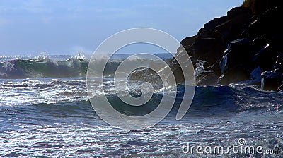 Big waves and rocky cliff at Swami`s Beach, Encinitas CA Stock Photo