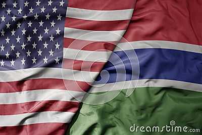 big waving colorful flag of united states of america and national flag of gambia Stock Photo