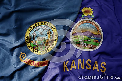 big waving colorful national flag of kansas state and flag of idaho state Stock Photo