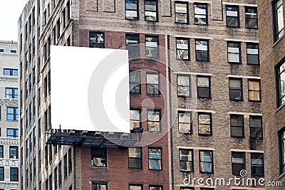 Big white billboard on the wall. Stock Photo