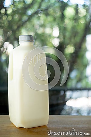 Big white plastic fresh milk bottle with gray cap Stock Photo
