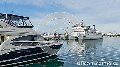 Big white three-deck motor ship `Dagomys` in Sochi Commercial Sea Port. Editorial Stock Photo