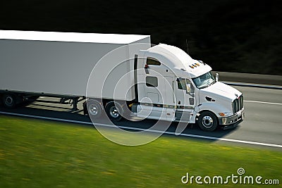 Big withe semi truck on highway Stock Photo