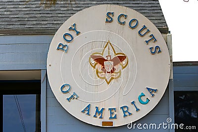 Big wooden sign on a building stating Boy Scouts of America Stock Photo