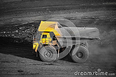 Big yellow mining truck empty body for anthracite. Open pit mine, extractive industry for coal Stock Photo