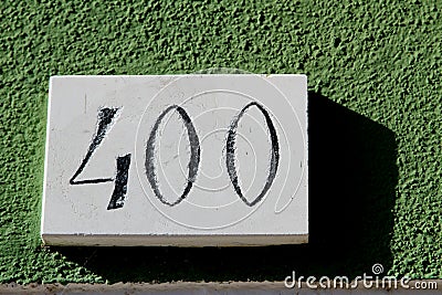 Bignumber 400 with green background Stock Photo