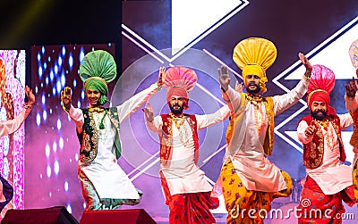 Punjabi sikh male performing bhangra dance at bikaner camel festival Editorial Stock Photo