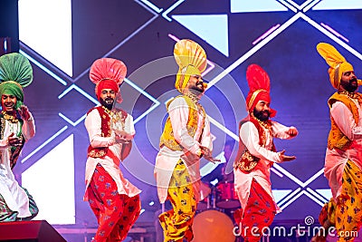 Punjabi sikh male performing bhangra dance at bikaner camel festival Editorial Stock Photo