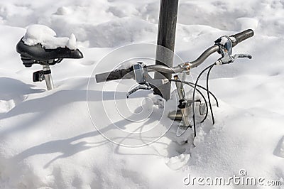 Bike burried in snow after Stella snowstorm Stock Photo