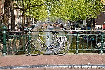 Bike on canal ring, Amsterdam Stock Photo