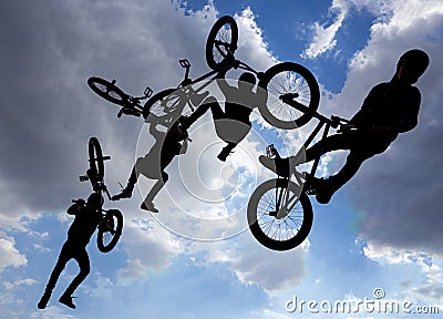 Bike jump silhouettes multiple exposure Stock Photo