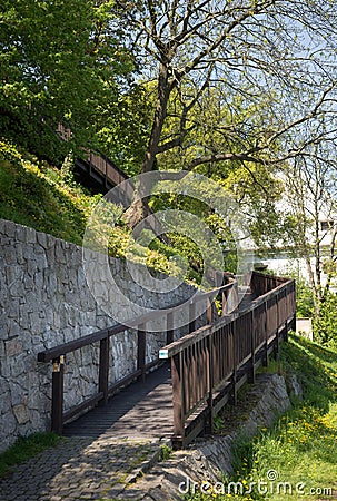 Bike lane bicycle cycle path wooden bridge approach descent EU supported project Stock Photo