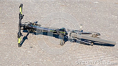 The bike is lying on the asphalt platform Stock Photo