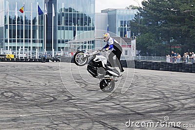 Bike wheelie motorcycle stunt rider acrobatics Editorial Stock Photo