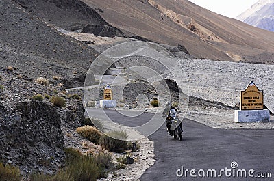 Biker Riding motorcycle on a winding road Editorial Stock Photo