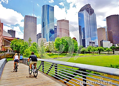 Bikers on Bridge in Buffalo Bayou Park - Houston, Texas Editorial Stock Photo