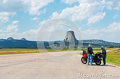 Bikers with Motorcycle, Devils Tower, Wyoming Editorial Stock Photo