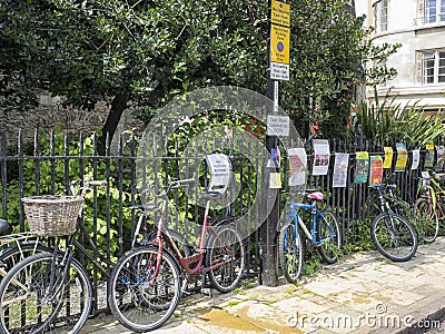 Bikes chained to railings in the City Centre Editorial Stock Photo