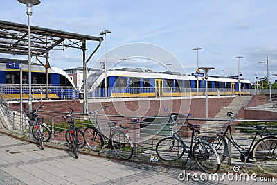 Bikes and modern commuter train in Germany Editorial Stock Photo