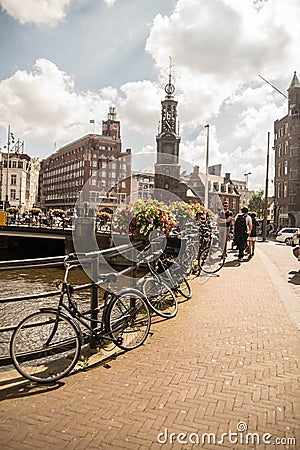 Bikes near the waterways of Amsterdam Editorial Stock Photo