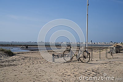 Biking on a beach Stock Photo