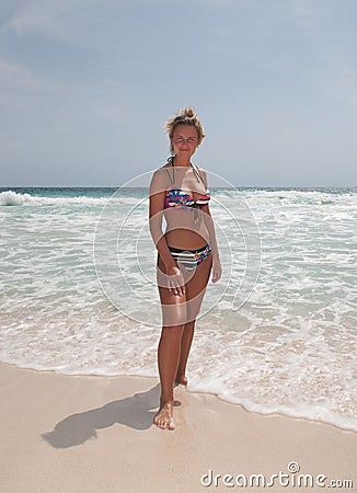 Bikini Girl at caribbean Sea beach Stock Photo