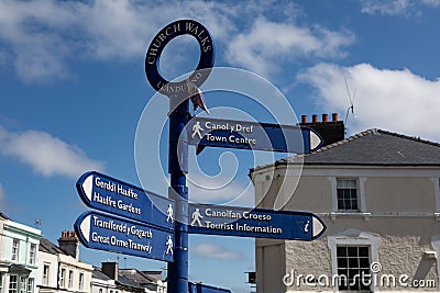 Bilingual street signs for pedestrians in the centre of Llandudno North Wales May 2019 Editorial Stock Photo