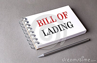 BILL OF LADING text on notebook on grey background Stock Photo