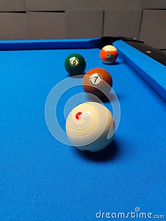 Billard balls on the blue carpet Stock Photo