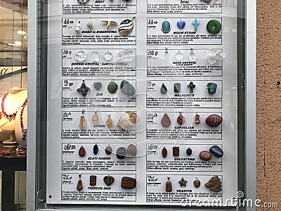 Billboard in front of a jewelry shop in Ljubljana which displays Gemstone of the Zodiac in Slovenian and English. Editorial Stock Photo