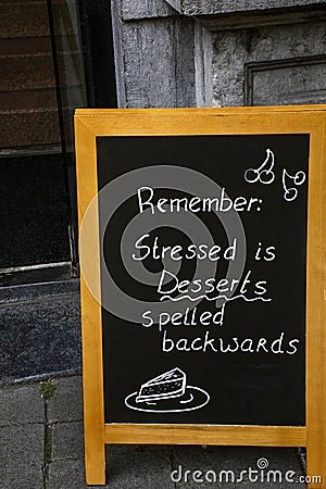 Billboard with inscription Stressed is Desserts spelled backwards Stock Photo