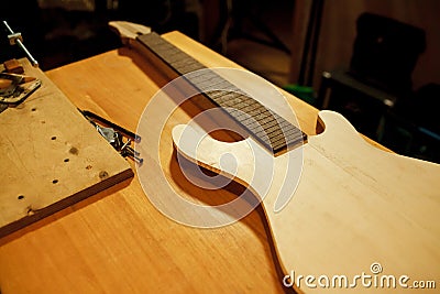 Billet of wood for bass guitar. Manufacture and repair musical instruments. Stock Photo