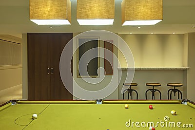 Billiard table in modern house Stock Photo